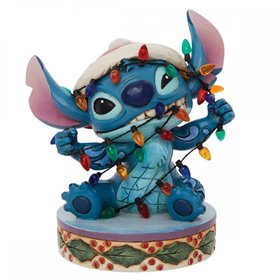 Figura Enesco Disney Stitch envolta em luzes de Natal